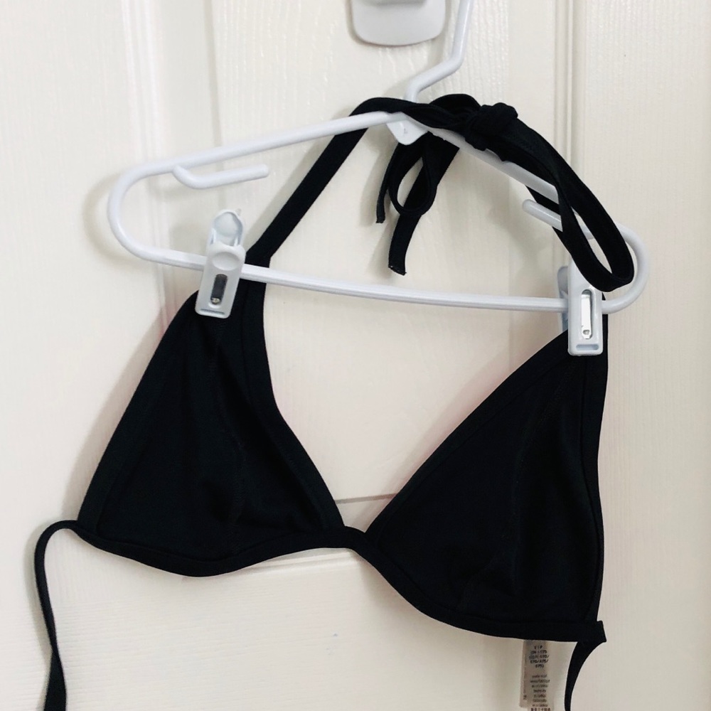 Pink bathing suit black top
